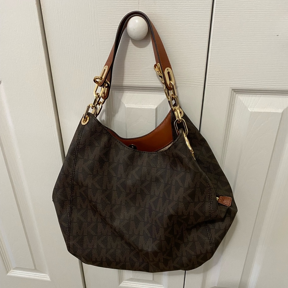 Good condition. I only used it three times. No stains or Smell.